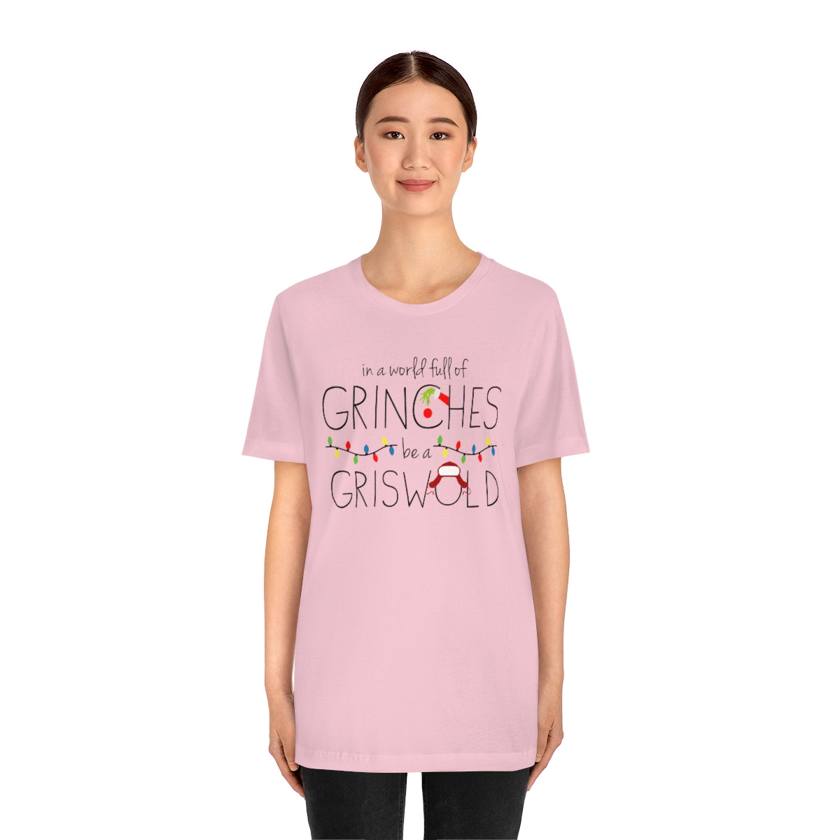 In a world full of GRINCHES be a GRISWOLD-Unisex Jersey Short Sleeve Tee