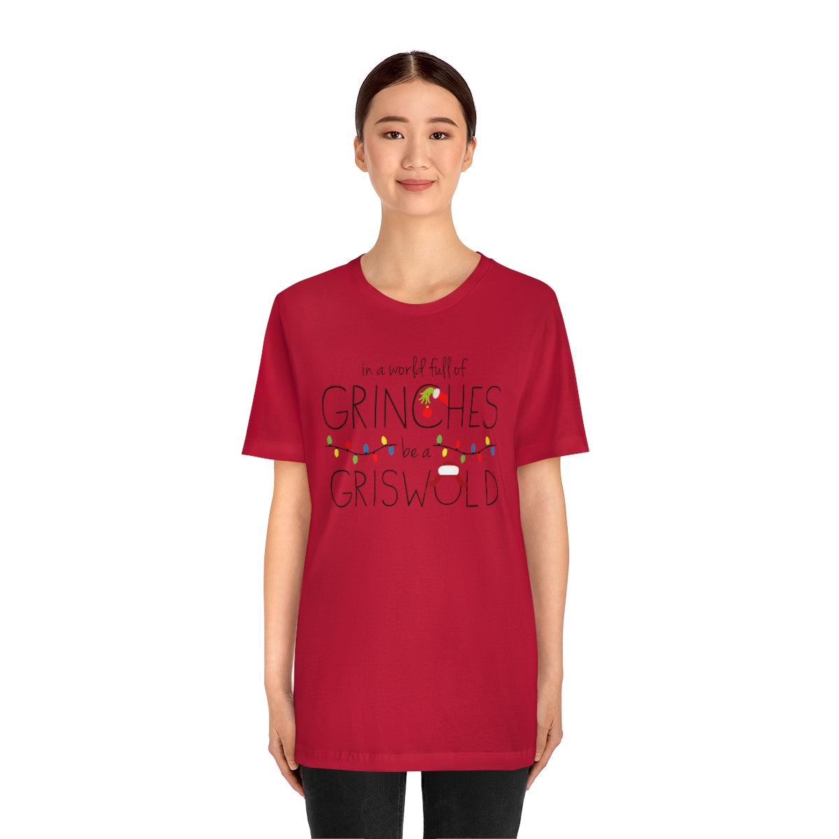In a world full of GRINCHES be a GRISWOLD-Unisex Jersey Short Sleeve Tee