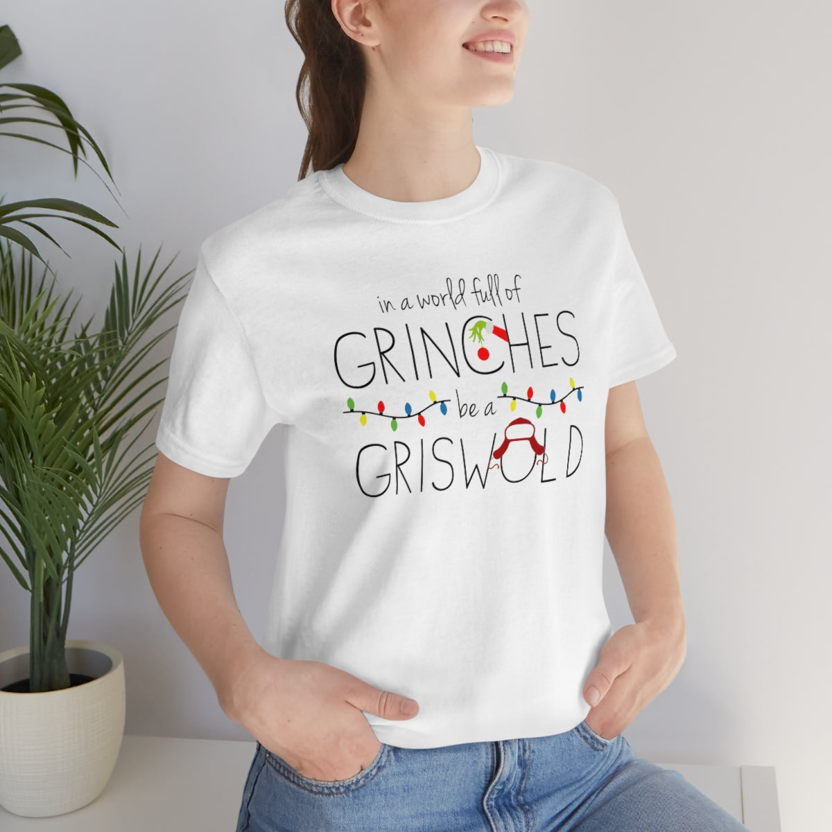 In a world full of GRINCHES be a GRISWOLD-Unisex Jersey Short Sleeve Tee