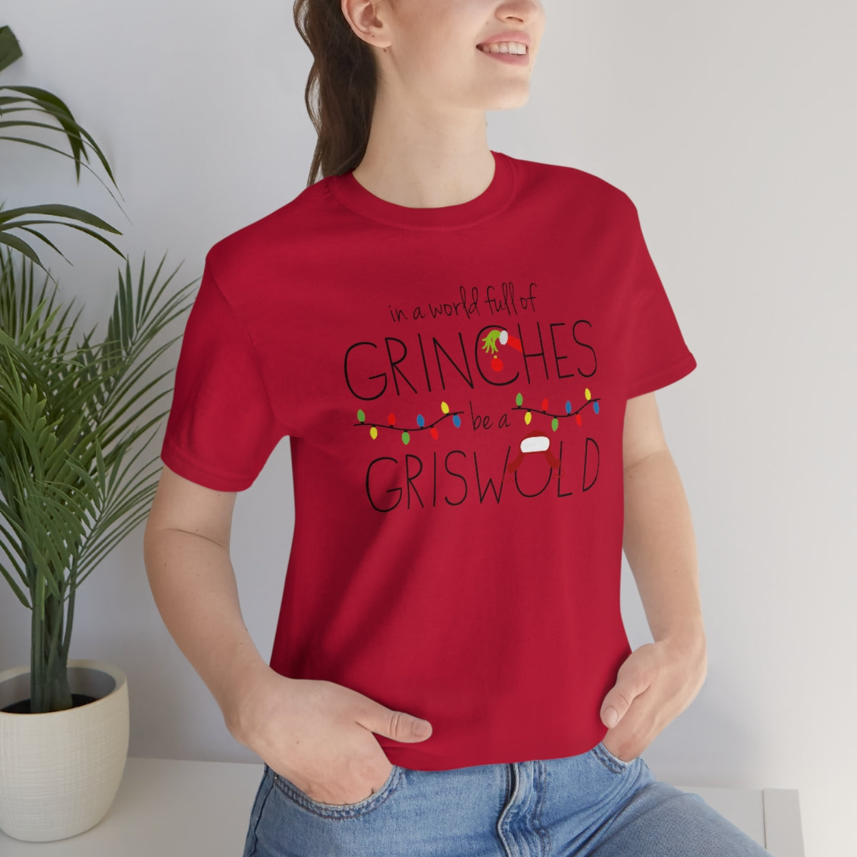 In a world full of GRINCHES be a GRISWOLD-Unisex Jersey Short Sleeve Tee